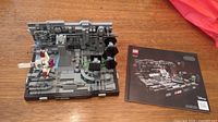 Front view of built diorama and instruction booklet