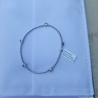 Full view of sterling silver bracelet on white background
