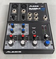 Top view of the Alesis MultiMix 4 USB FX mixer showing inputs, controls, and headphone jack.