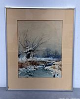 Full view of the framed watercolor painting showing winter landscape with snow and a stream