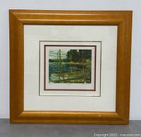 Frontal view of framed limited edition print showing frame and mat