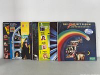 Display of seven LP vinyl records including Bad Boys Blue and other artists, showing front covers.