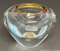 Side angle view highlighting thickness, shape, and label of the vintage Waterford Evolution crystal vase.