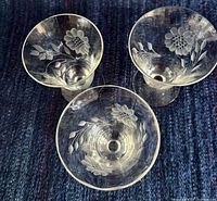 Top view showing Cornflower etching on three glasses