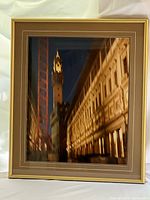 Front view of framed photograph showing image, matting and frame