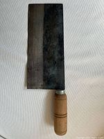 Full view of cleaver front side showing blade and handle