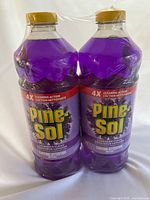Front view of two sealed 1.41 L Pine-Sol Lavender Clean bottles