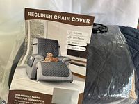 Front of retail insert showing recliner cover on chair with features list