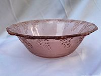 Side view of pink Depression glass bowl