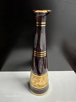 Full view of vase front showing overall shape, color, and gilding