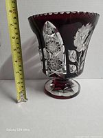 Full view of vase with tape measure showing height around 7 inches