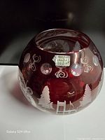 Front view of ruby cut-to-clear vase with label visible