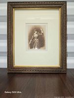 Front view showing entire framed photograph