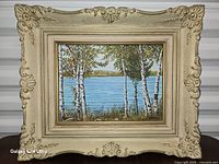 Front view of framed oil painting