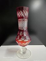 Full front view of ruby cut-to-clear crystal vase