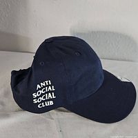 Left side view showing logo and overall cap