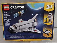 Front of sealed Lego Creator 31134 box showing shuttle image and piece count