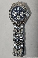 Front view of Fossil Blue chronograph wristwatch showing dial, bezel and bracelet.