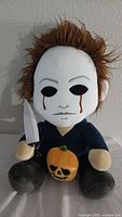 Front view of Michael Myers Halloween II plush doll holding fabric knife