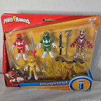 Front view of sealed Imaginext Power Rangers battle pack showing figures and weapons