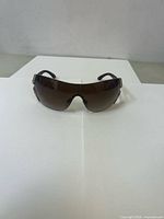 Front view of Bvlgari shield sunglasses showing lens tint and overall style