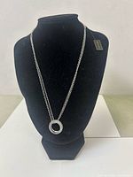 Full view of necklace on display bust