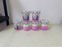 Six sealed jars front view