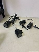 Four Lorex MC7540 cameras showing cables and partial mounts