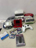 Overview of all electronics and games on table