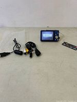 Camera front view with cables and tag