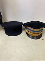 Front view of both military caps