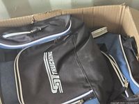 Backpacks visible in box