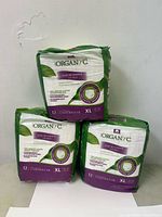 Three sealed packs of Organyc XL protective underwear