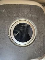 Close-up of sink drain opening
