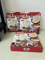 Front view of three sealed Chef Basket boxes