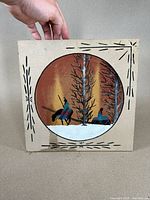 Full view of the Navajo sand painting with signature and surrounding decorative border