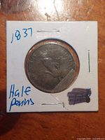 Coin in 2x2 holder, date 1837 noted