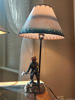 Full view of firefighter lamp on table