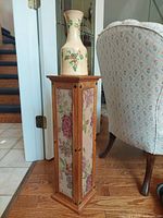 Pedestal stand and vase together front view