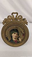 Front view of framed Madonna and Child portrait
