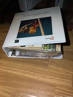 Closed HydrOne binder filled with comics