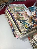 Stack of bagged vintage Marvel comic books