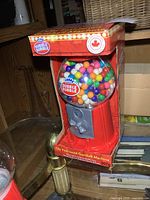 Front view of boxed Dubble Bubble gumball machine