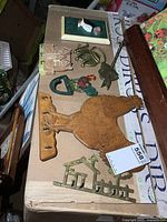 Overview of six key racks and hooks on cardboard surface