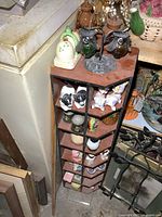 Full view of wood rack filled with shakers