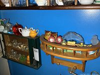 Both wall shelves with contents