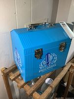 Front angled view showing logo and latches