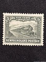 Front of 5-cent Newfoundland locomotive stamp showing design and perforations