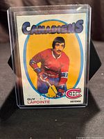 Front of 1971-72 O-Pee-Chee #145 Guy Lapointe card in holder