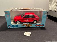 Front view of boxed red 1:24 scale Dodge Omni GLH Turbo model